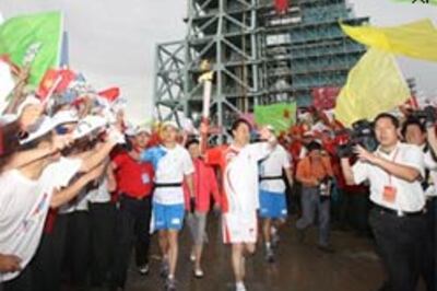 China-based Indian woman runs in Olympic torch relay