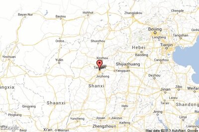 1 killed, 8 injured in bomb attack outside China's Communist Party office