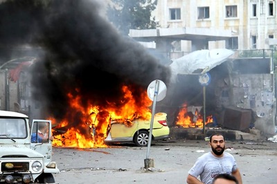 Bombs Kill More than 100 in Syria Regime Strongholds