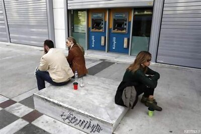 Cyprus scrambles to avert meltdown, EU threatens cutoff