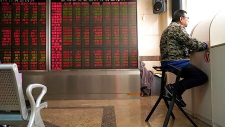 Asian stocks pause for breath after Wall Street's record run
