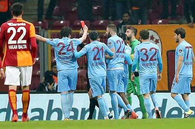 Watch: Footballer sent off for flashing red card to referee