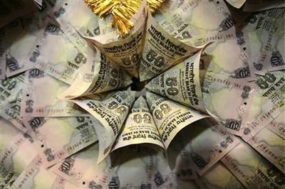 Rupee hits record low on local stocks, risk aversion