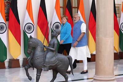 Modi and Merkel vow trade talks and 2.25 billion green energy dollars