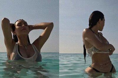 Sexy! Kim Kardashian Flaunts Cleavage As She Slips into Racy Bikini for Swim, Hot Photos Go Viral