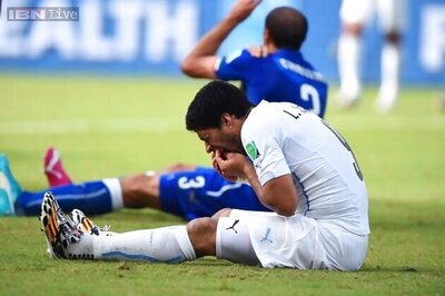 World Cup 2014: FIFA bans Uruguay's Suarez for four months for biting opponent