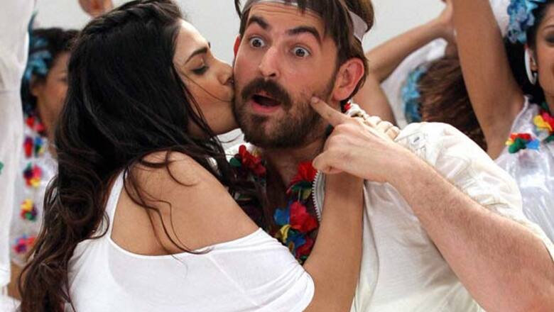 Snapshot: Puja Gupta startles Neil Nitin Mukesh with a kiss on the cheek!
