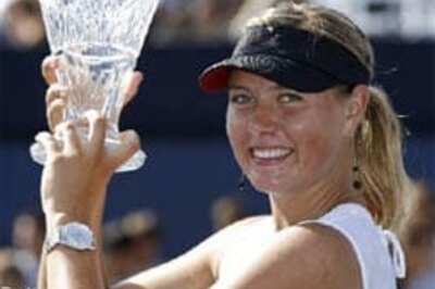 Sharapova warms up for US Open with Acura win