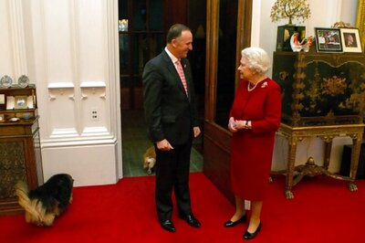 Britain Queen's dogs served steak on silver platters