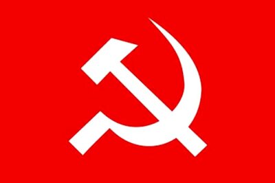 CPM member displays teargas grenade in Assembly