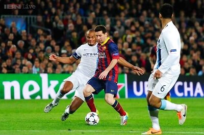 Lionel Messi guides Barcelona past City into Champions League quarters