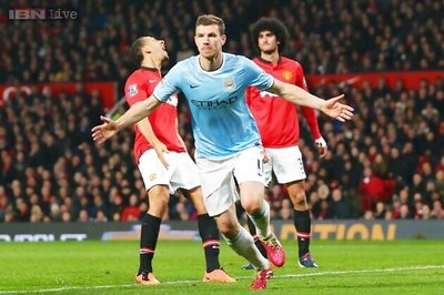 Edin Dzeko scores twice as City thrash United 3-0 in Manchester derby