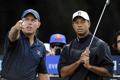 Woods opens Australian Masters defence with a 69