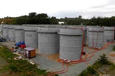 Japan says Fukushima leak worse than thought, government joins clean-up