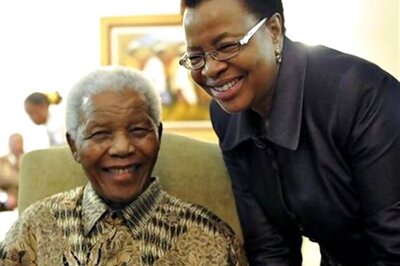 Nelson Mandela's health is improving, but to stay in hospital