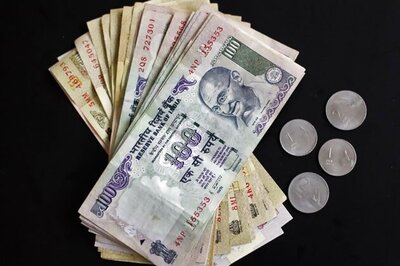 Rupee opens higher; RBI policy awaited