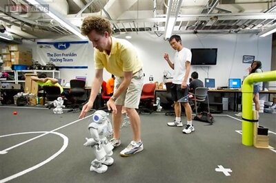 RoboCup 2014: Can robots beat human football Word Cup champions by 2050?
