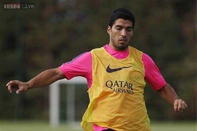 Luis Suarez pledges not to bite again