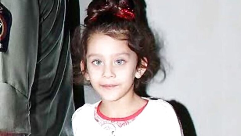 Snapshot: Awww! A shy Iqra Dutt poses with dad Sanjay Dutt's cut-out at the 'Ungli' screening
