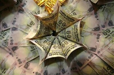 Rupee hits record low of 56.57 vs US dollar