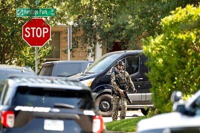 3 Texas officers shot by gunman, who holds 3 people in home