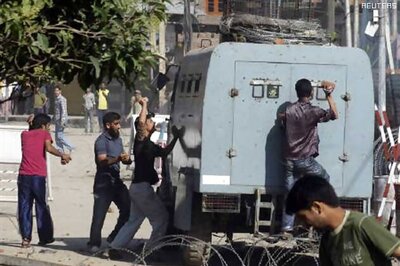 Bricks and bullets fly, Srinagar shuts down