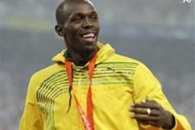 Bolt sets athletics alight with treble strike