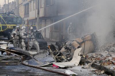 Small plane crashes in Colombia capital; 4 dead, 12 injured