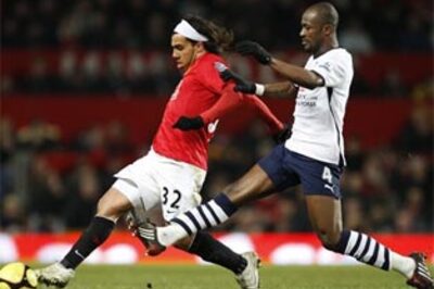 Manchester United through at Tottenham Hotspur's expense