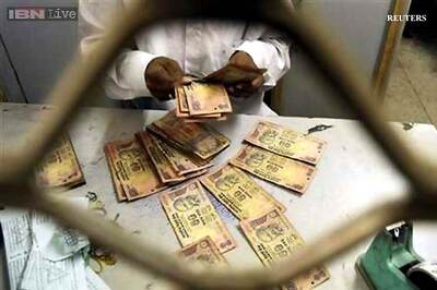 Rupee hits new 20-month low against dollar; ends 10 paise down