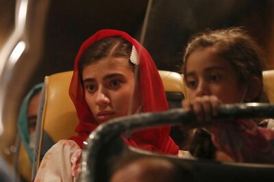 'I Took the Clothes on Me and Left': Afghans Escape Taliban Into New US Life