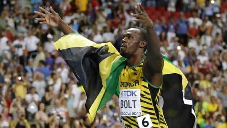 Usain Bolt wins men's 100 amid steady rain