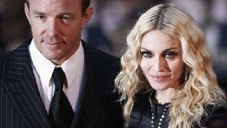 Reunion on cards? Madonna pens song for ex-husband