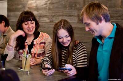 Foursquare adds comment, photos