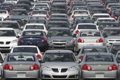 General Motors cuts jobs, dealers jittery