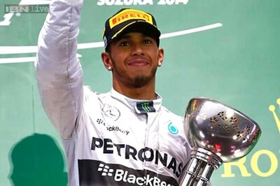 Mercedes' Lewis Hamilton wins rain-interrupted Japanese Grand Prix