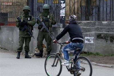 Russian troops seize Ukraine marine base in Crimea