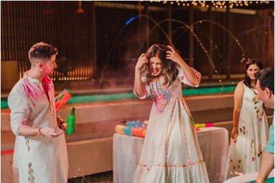 In Adorable Throwback Pic, Priyanka Chopra and Nick Jonas Play Holi