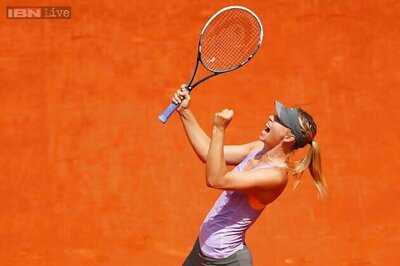 Sharapova ousts Radwanska to claim Madrid Open final berth