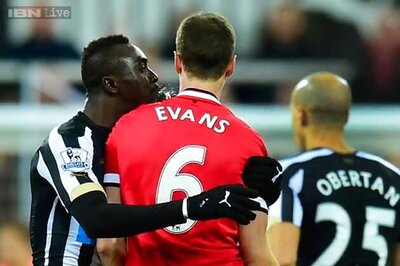 Papiss Cisse and Jonny Evans handed hefty bans for spitting
