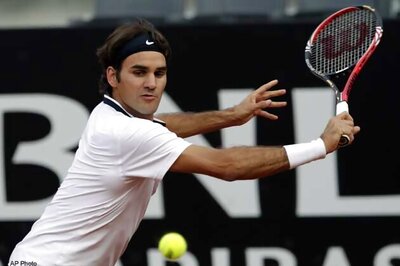 Federer posts doubles win at Rome Masters