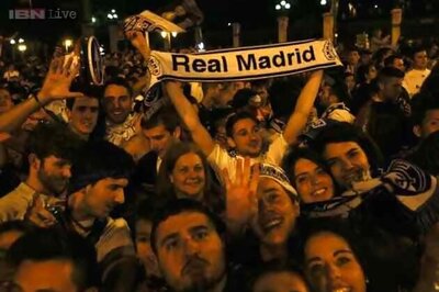 Real Madrid fans celebrate on night of contrasting emotions