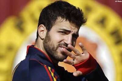 Spain say Fabregas could play despite injury