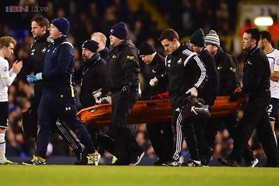 Swansea striker Bafetimbi Gomis collapses during Premier League match