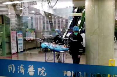 Escaping the Virus Lockdown in Wuhan Would Have Torn His Family, So He Stayed