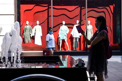 China factory output flat, retail sales slip in July