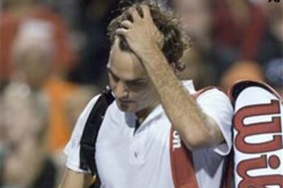 Federer suffers Toronto upset, Nadal wins