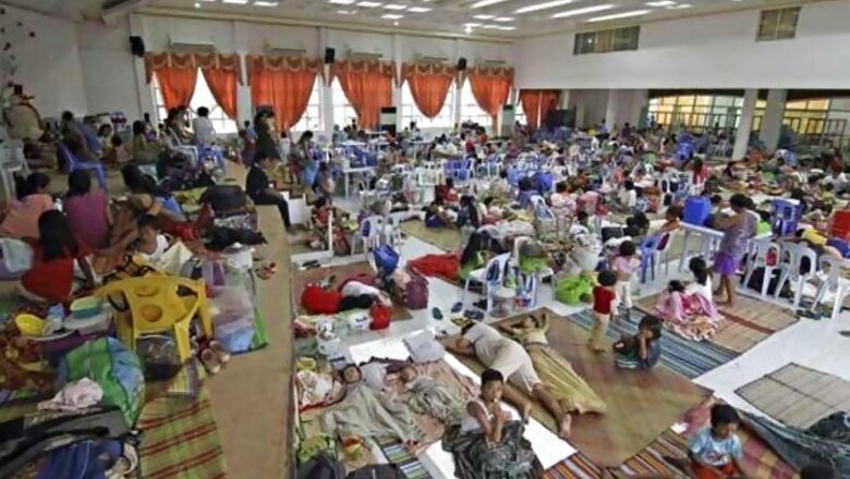 Trees felled, power cut as typhoon hits Philippines