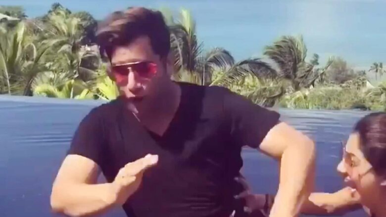 Shilpa Shetty Pushes Rajiv Adatia Into The Pool During Water Yoga, Calls The Prank 'Priceless'
