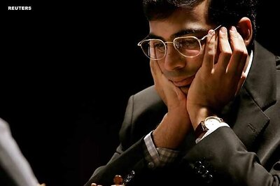 Anand crushes Topalov, moves to joint second